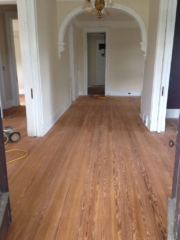 Sanded and cleaned hardwood floors.