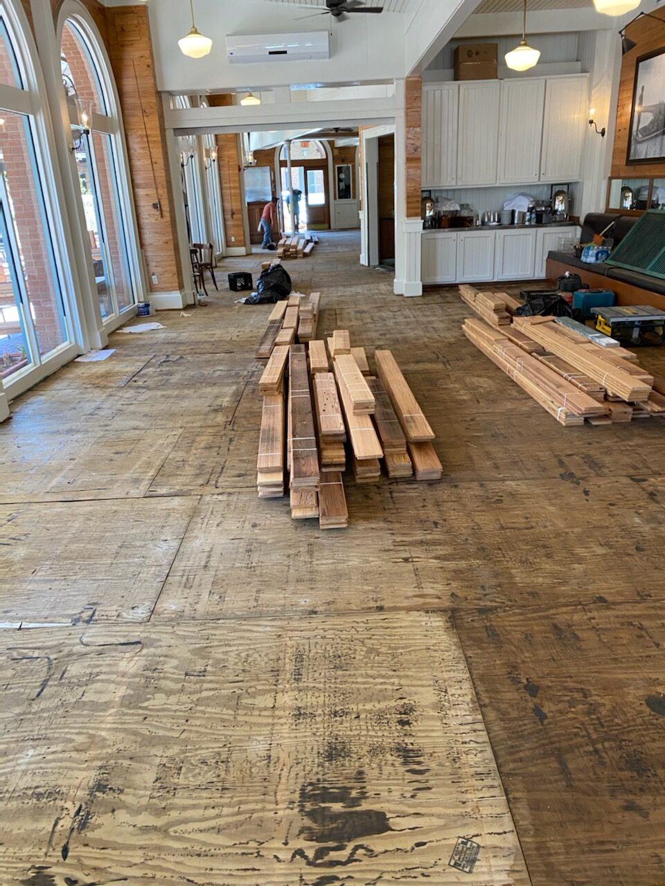 Photo of demoed wood flooring in a restaurant.