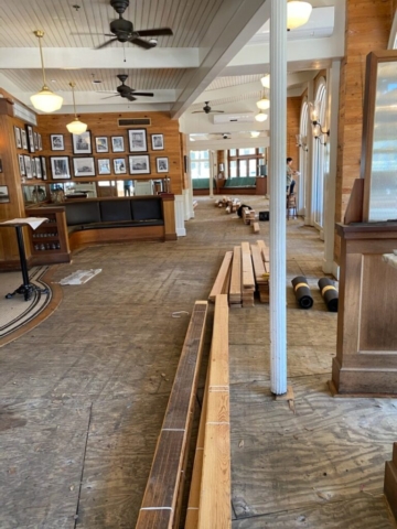 Photo of subflooring in a restaurant. New wood acclimating to be installed.