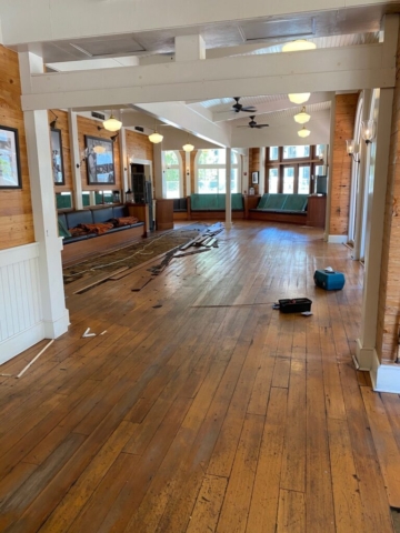 Existing hardwood flooring in a restaurant to be demoed and replaced with new hardwood flooring.